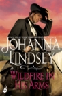 Wildfire In His Arms : A dangerous gunfighter falls for a beautiful outlaw in this compelling historical romance from the legendary bestseller - Book