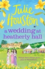 A Wedding at Heatherly Hall : The brand-new for 2024 cosy and uplifting village romance to curl up with from Julie Houston - Book