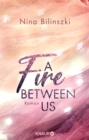 A Fire Between Us : Roman - eBook