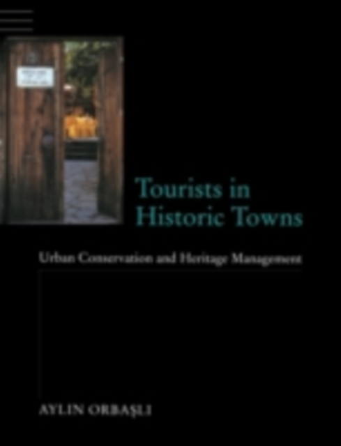 Tourists in Historic Towns : Urban Conservation and Heritage Management, PDF eBook