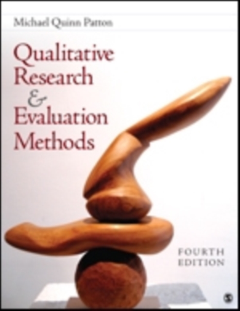 Qualitative Research & Evaluation Methods : Integrating Theory and Practice, Hardback Book